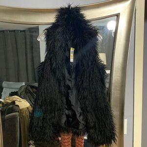 INC black shaggy vest slim fit size medium 31inches long from collar to bottom